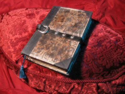 'Necronomicon prop' by Shubi(Shubi) - Self-made just for fun.. Licensed under Public domain via Wikimedia Commons - http://commons.wikimedia.org/wiki/File:Necronomicon_prop.jpg#mediaviewer/File:Necronomicon_prop.jpg