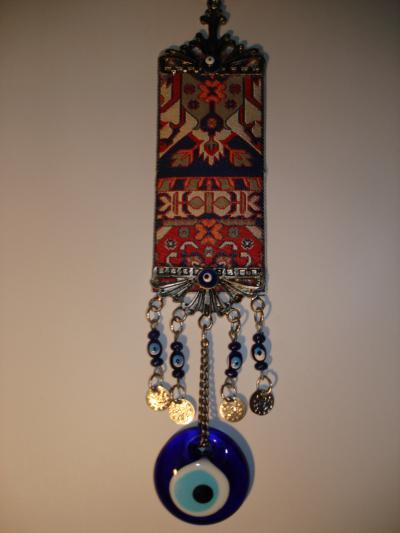 'Iranian amulet' by Thierry.Baubet - Own work. Licensed under Public domain via Wikimedia Commons - http://commons.wikimedia.org/wiki/File:Iranian_amulet.jpg#mediaviewer/File:Iranian_amulet.jpg