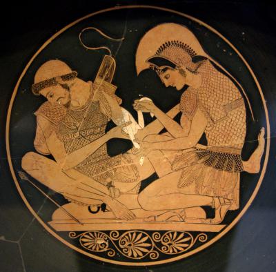 'Akhilleus Patroklos Antikensammlung Berlin F2278' by Sosias (potter, signed). Painting attributed to the Sosias Painter (name piece for Beazley, overriding attribution) or the Kleophrades Painter (Robertson) or Euthymides (Ohly-Dumm) - User:Bibi Saint-Pol, own work, 2008. Licensed under Public domain via Wikimedia Commons - https://commons.wikimedia.org/wiki/File:Akhilleus_Patroklos_Antikensammlung_Berlin_F2278.jpg#mediaviewer/File:Akhilleus_Patroklos_Antikensammlung_Berlin_F2278.jpg